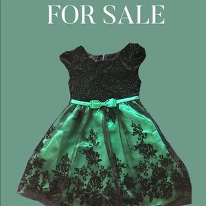 Sparkly green and black formal dress for girls